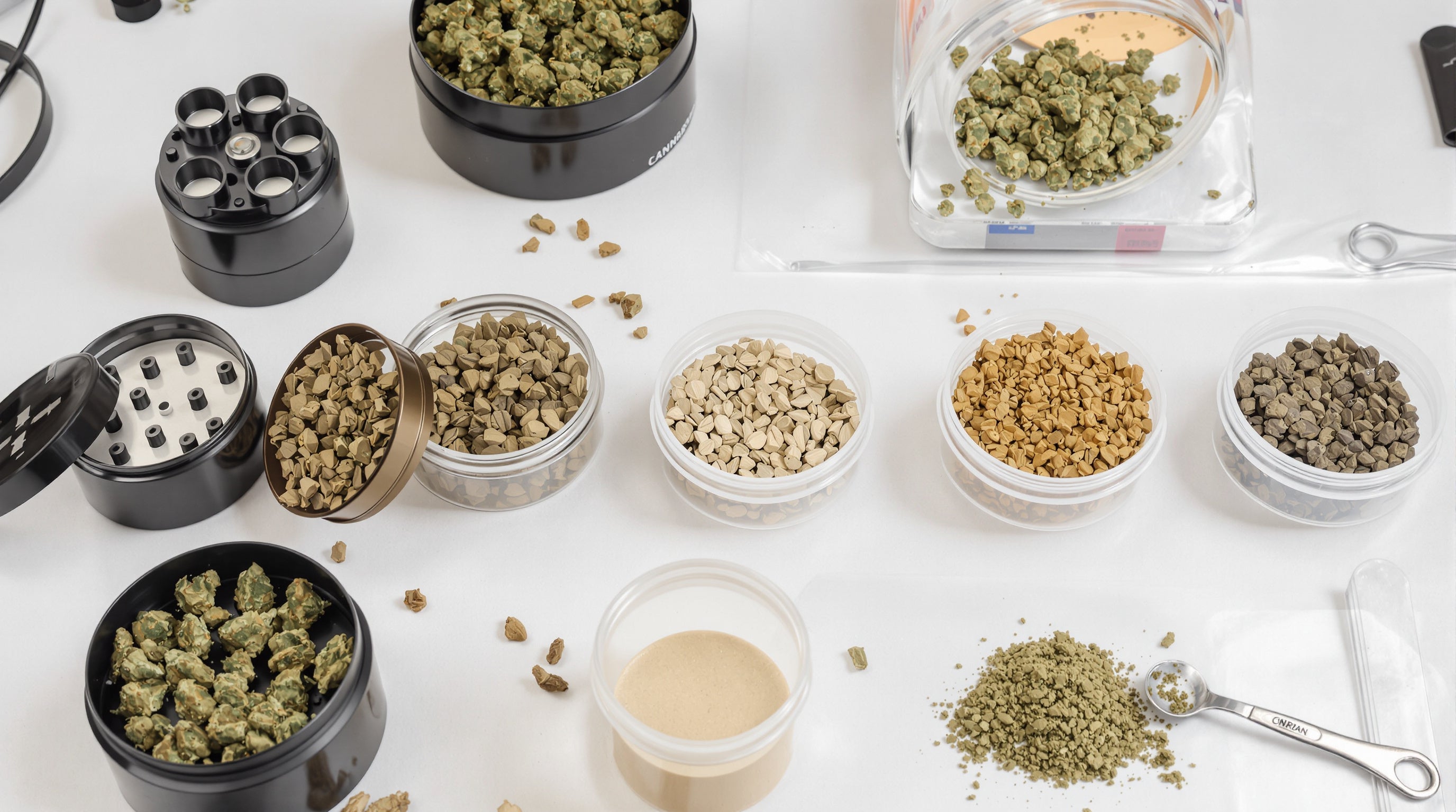 Multiple grinders and ground material samples showing particle size variations for cone filling