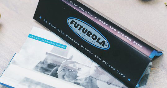 Futurola king-size rolling papers with filter tips, ultra-thin and slow-burning for a premium rolling experience.