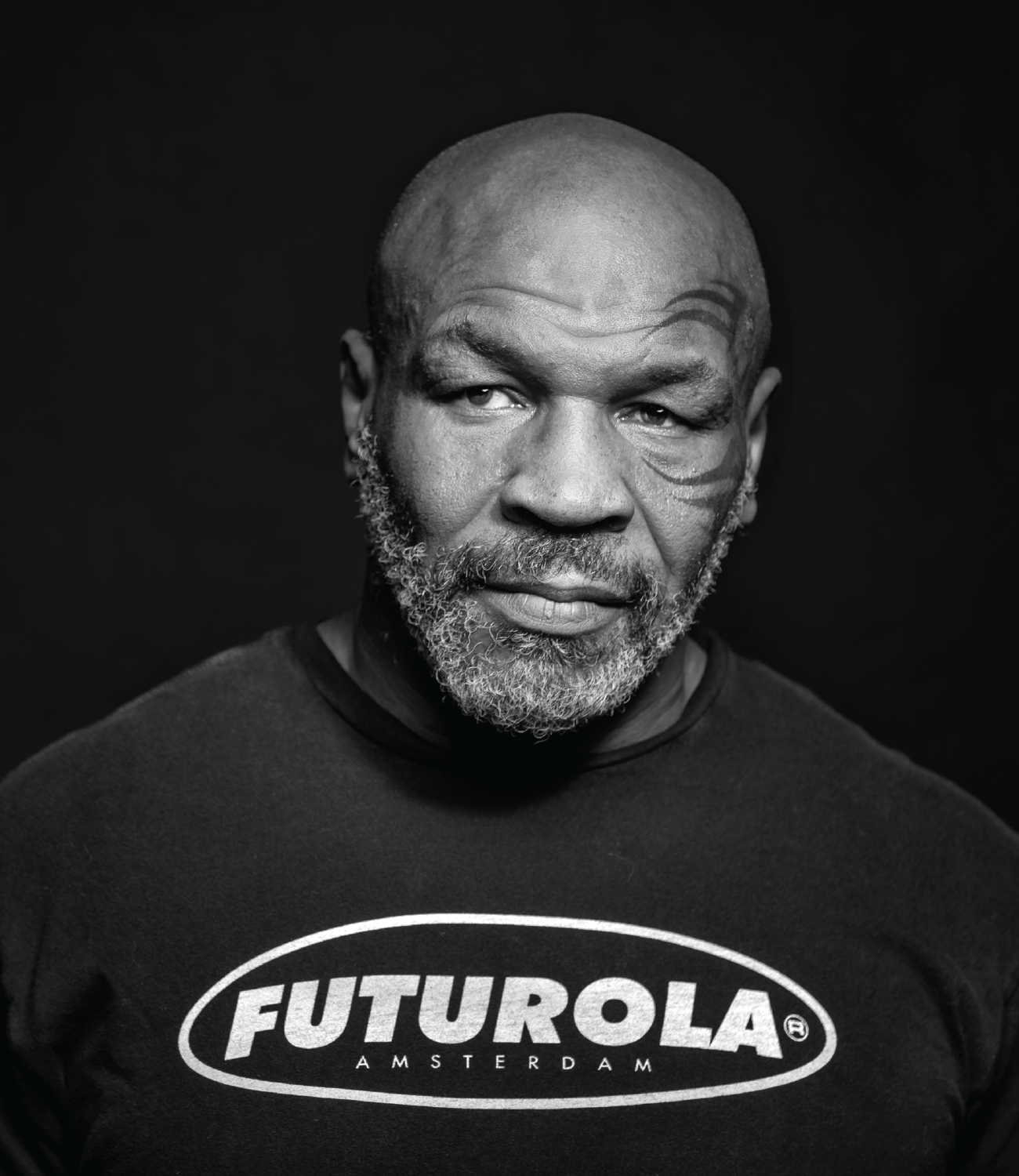 Mike Tyson wearing a Futurola Amsterdam shirt, representing the exclusive Futurola x Tyson rolling collection.